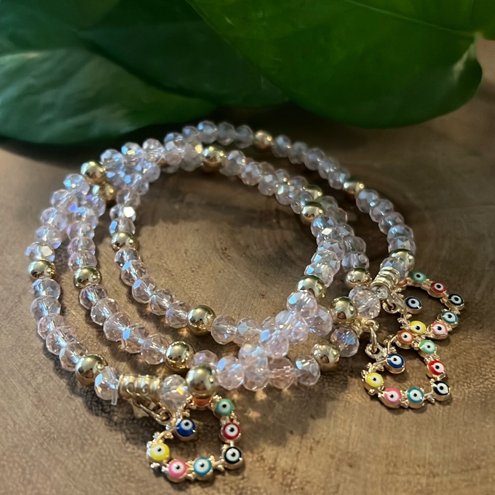 Set of 3 handmade stretch novelty bracelets with evil eye heart charm